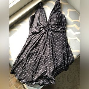 Miraclesuit size 12 black with white dots skirted swimsuit.